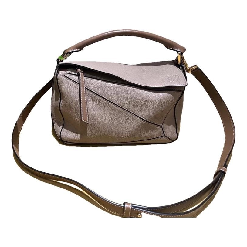 Puzzle leather handbag