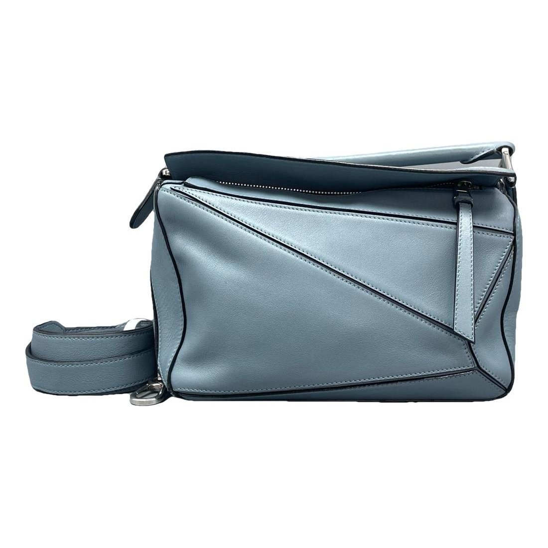 Puzzle leather handbag