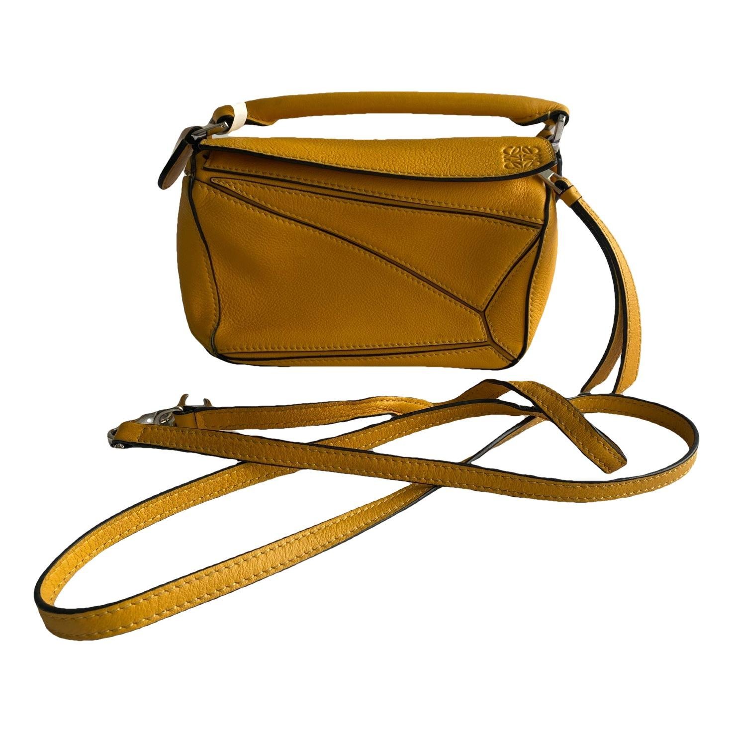 Puzzle leather handbag