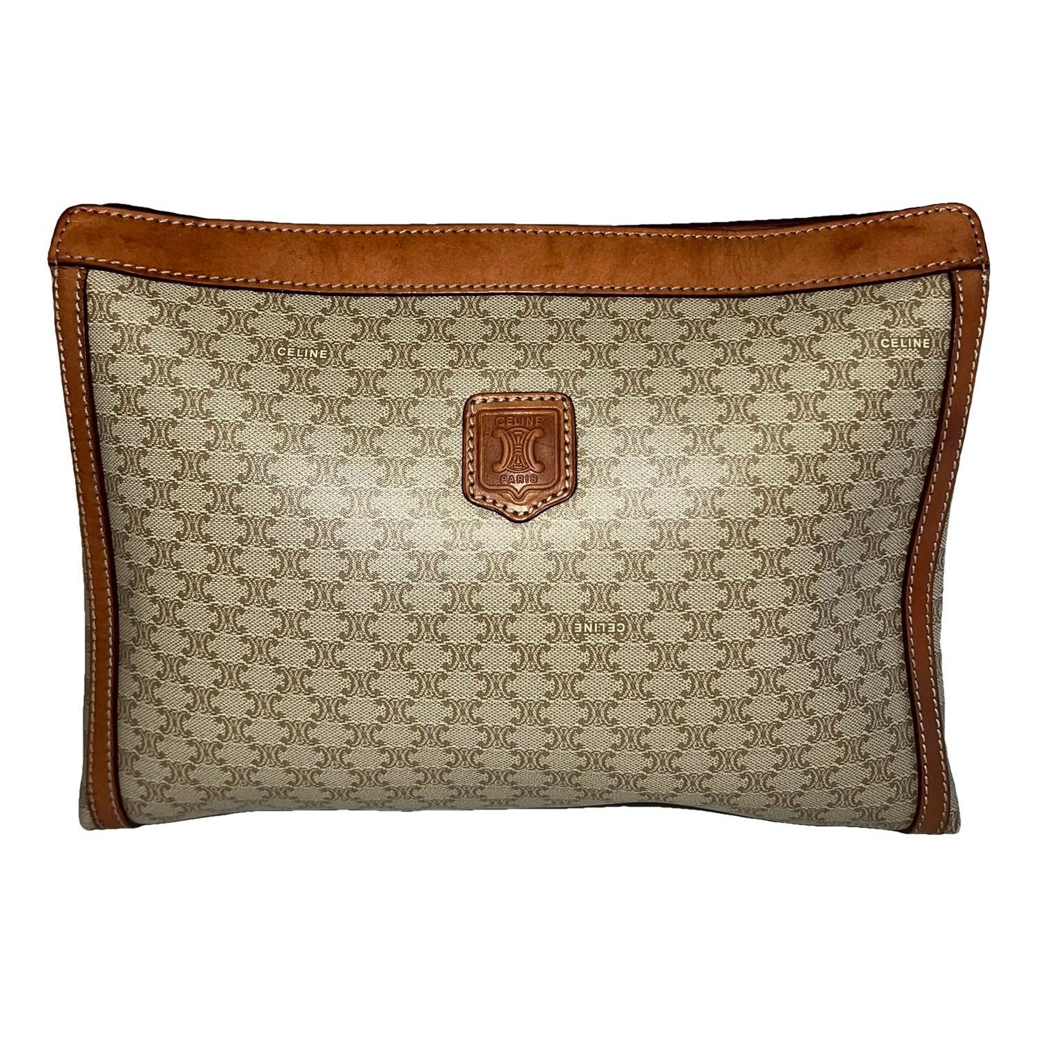 Triomphe Vintage leather clutch bag