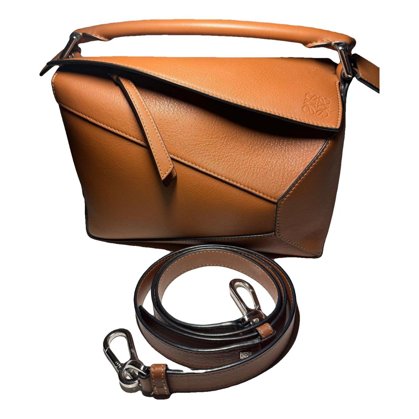 Puzzle leather handbag