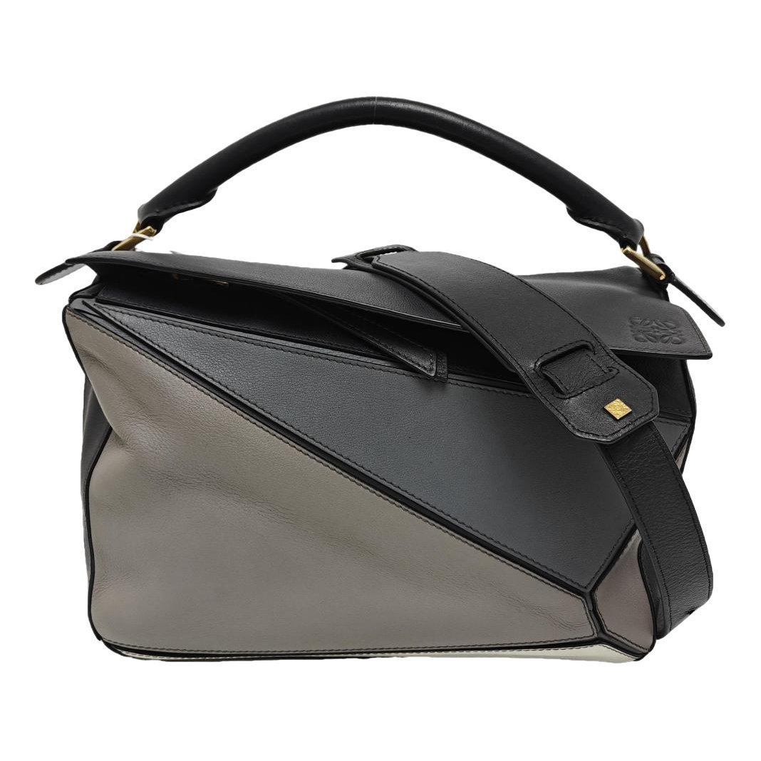 Puzzle leather handbag
