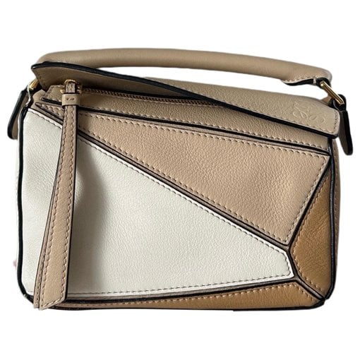 Puzzle leather handbag