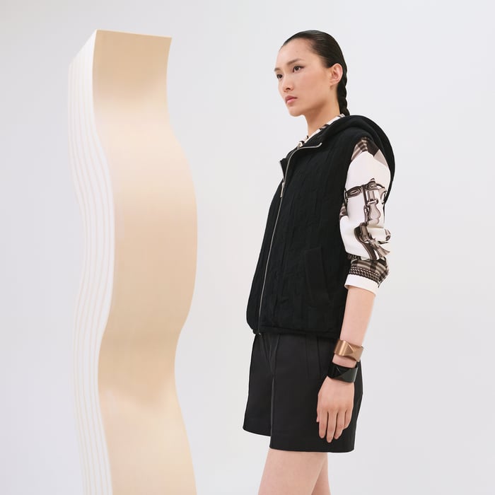 Noir "H" Quilted Sleeveless Jacket