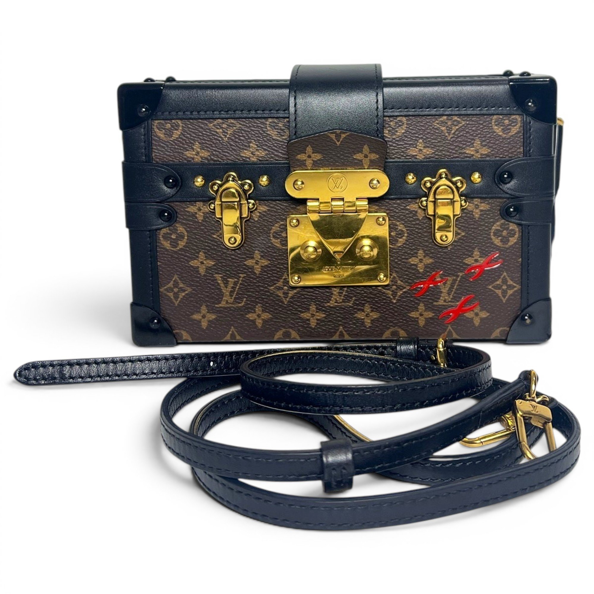Pochette Trunk leather handbag