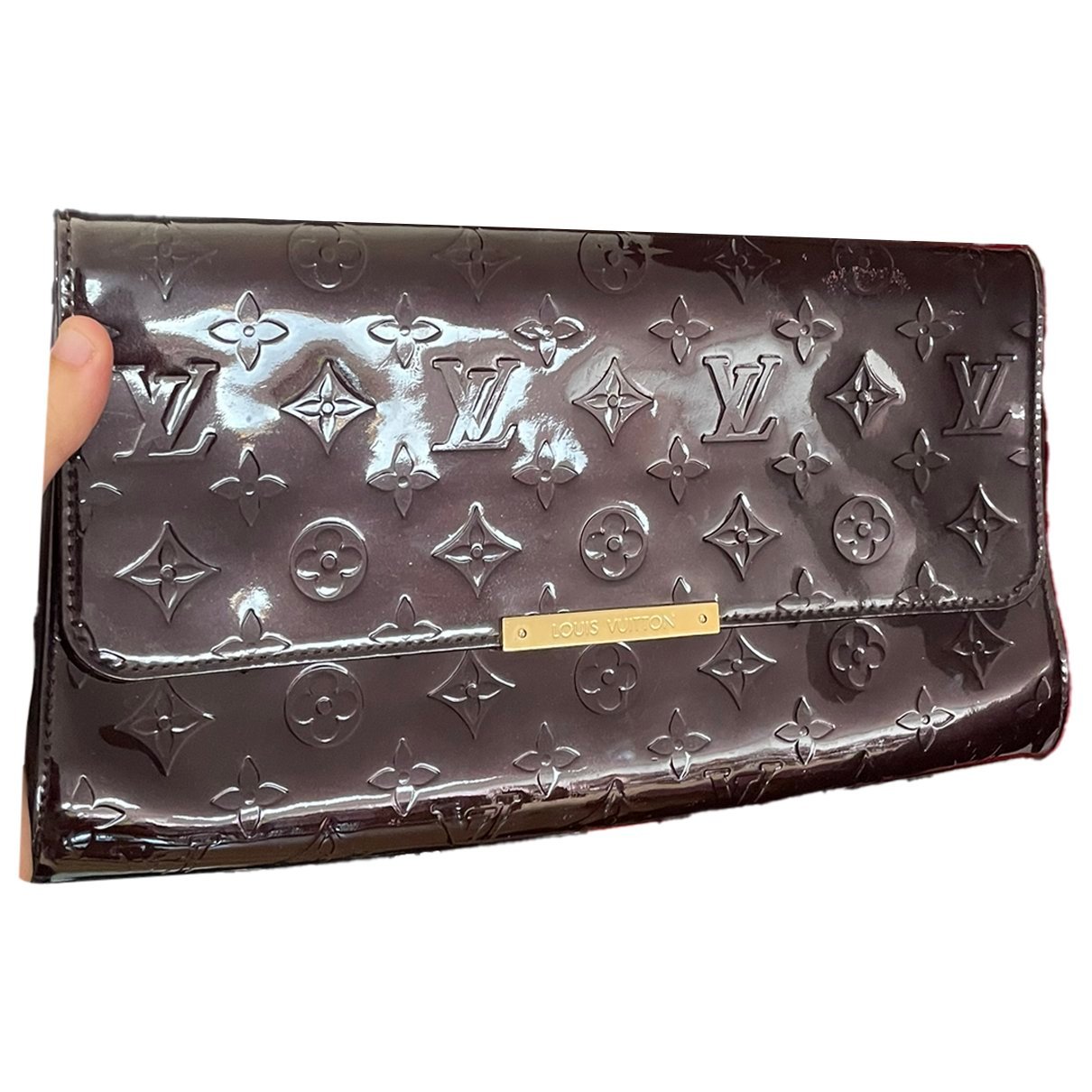 Croissant patent leather handbag