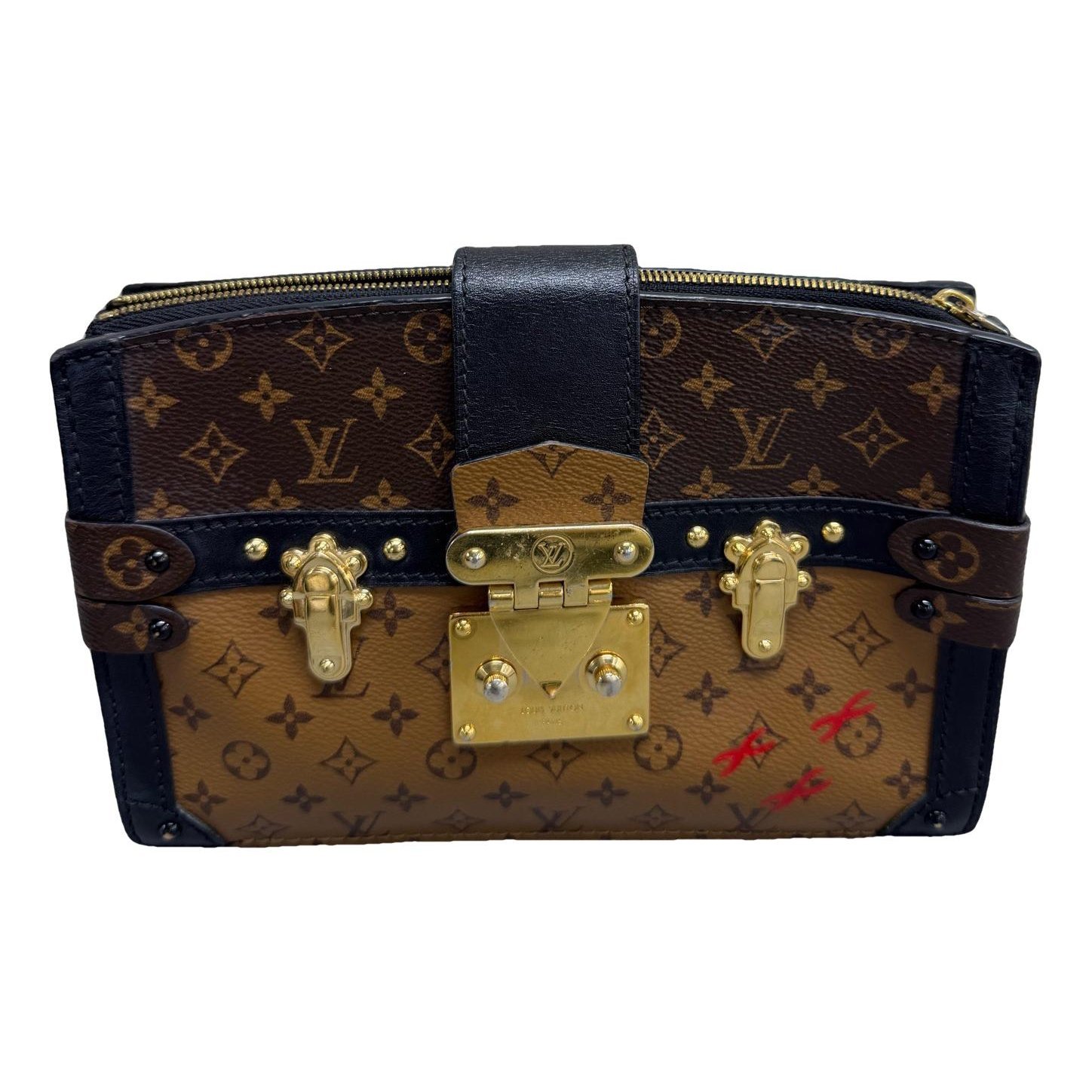 Pochette Trunk leather handbag