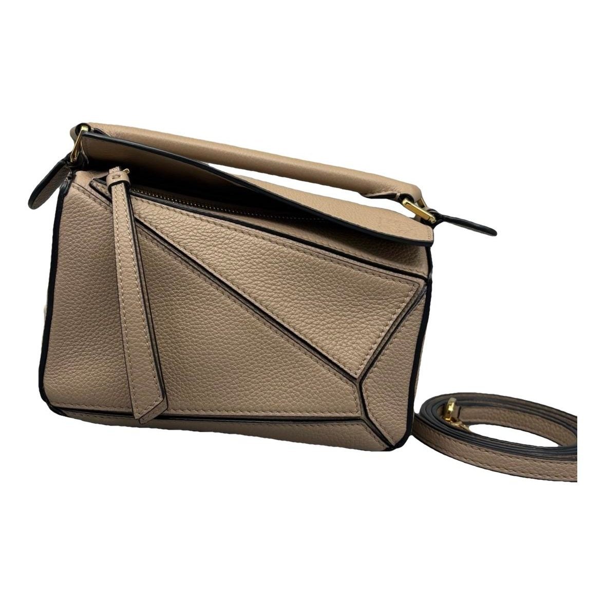 Puzzle leather handbag