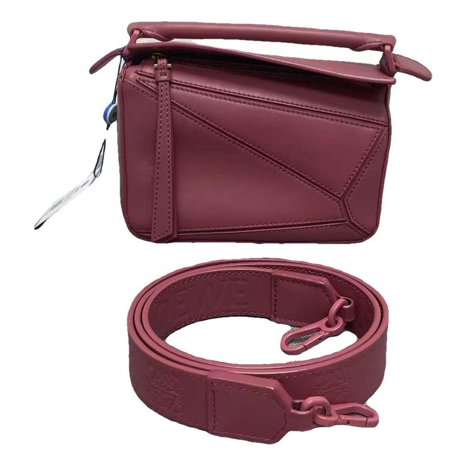 Puzzle leather handbag