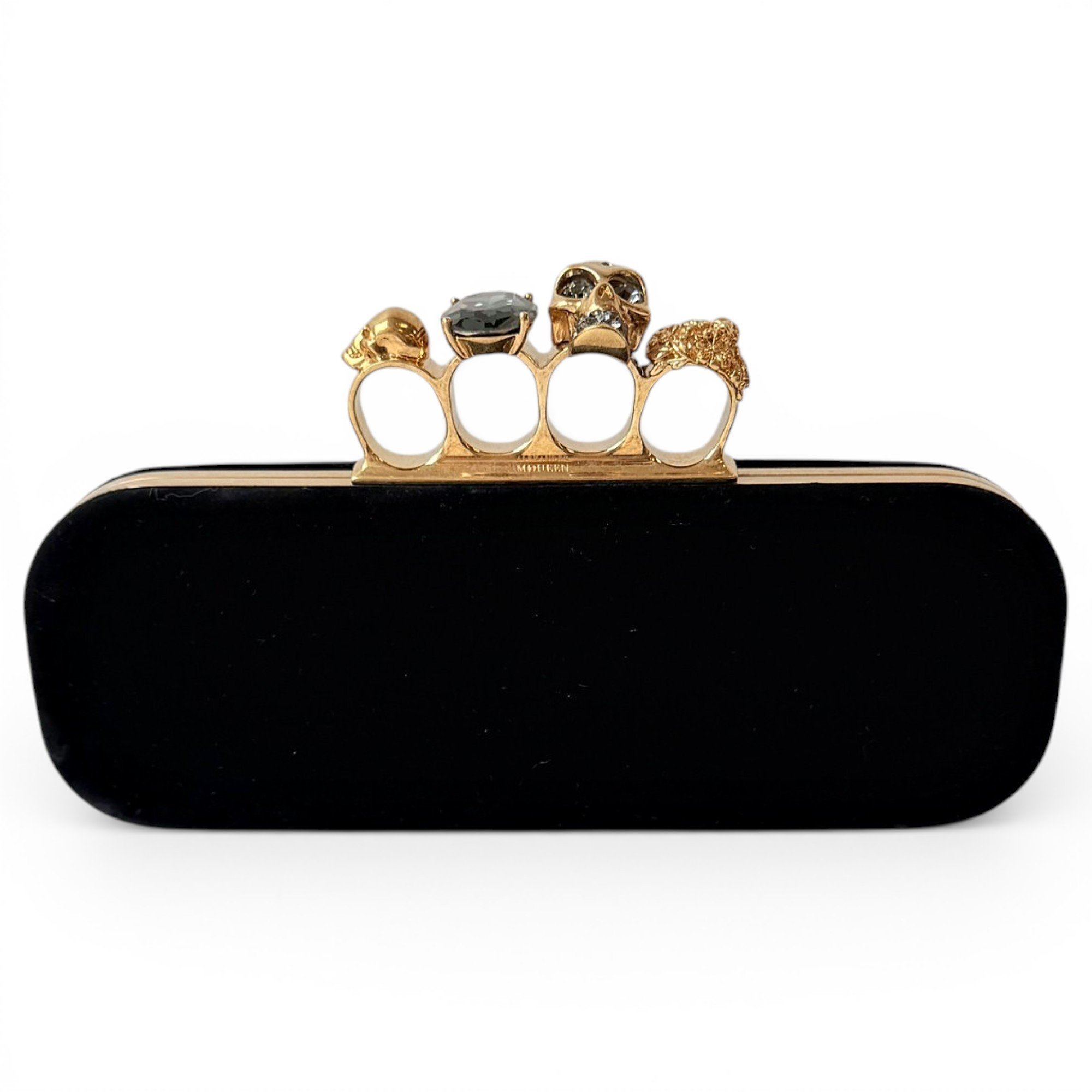 Knuckle velvet clutch bag