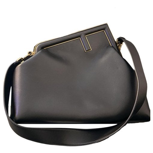 First leather handbag