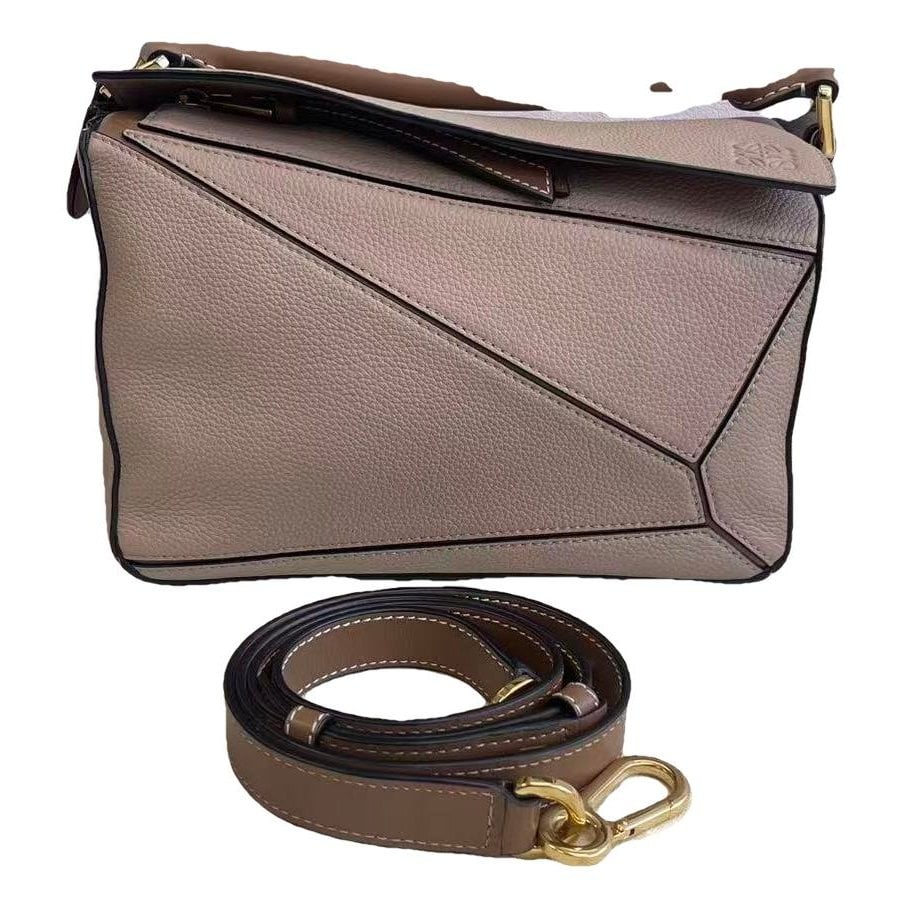 Puzzle leather handbag