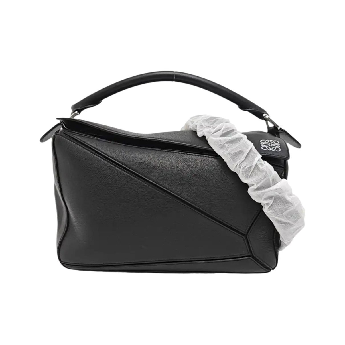 Puzzle leather handbag