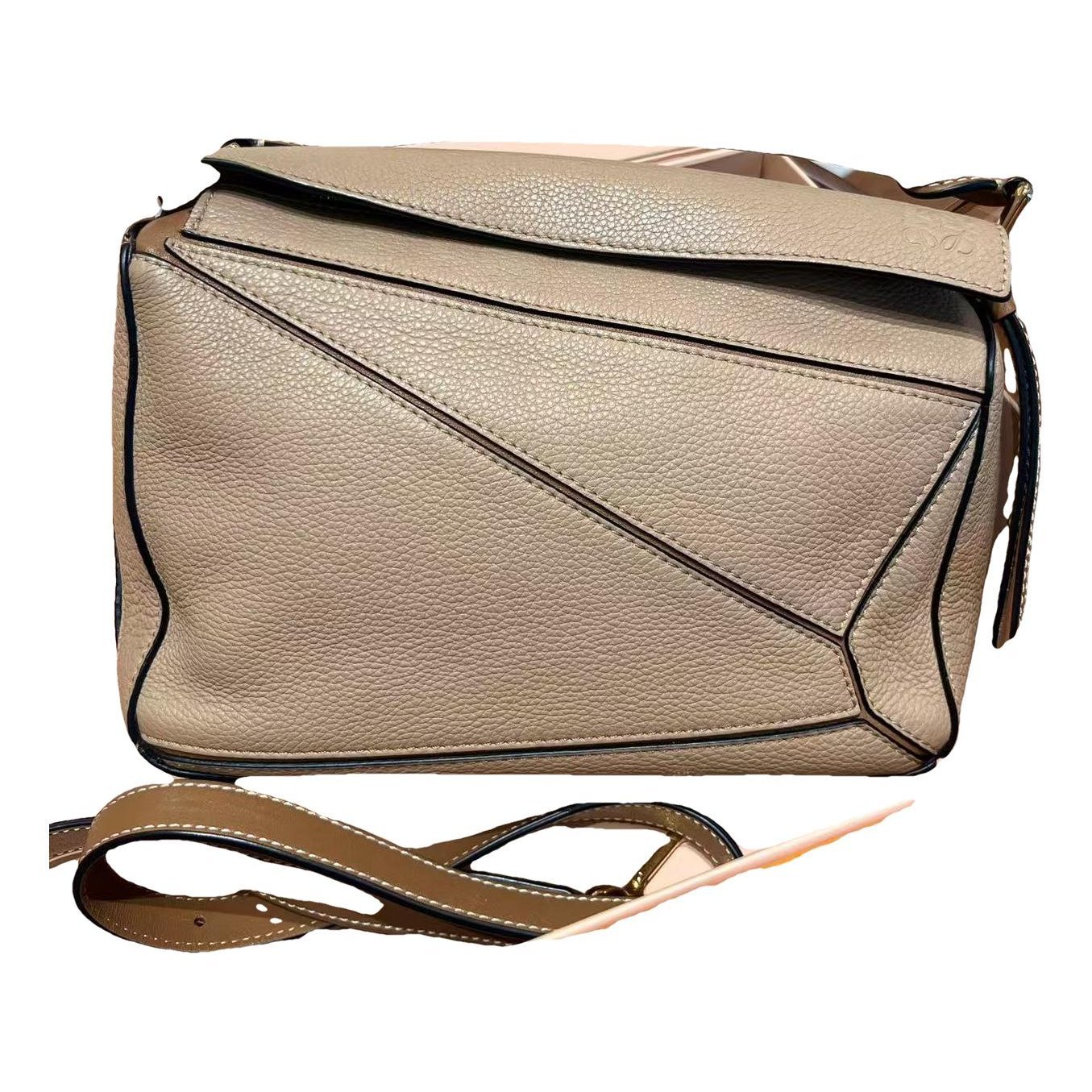 Puzzle leather handbag