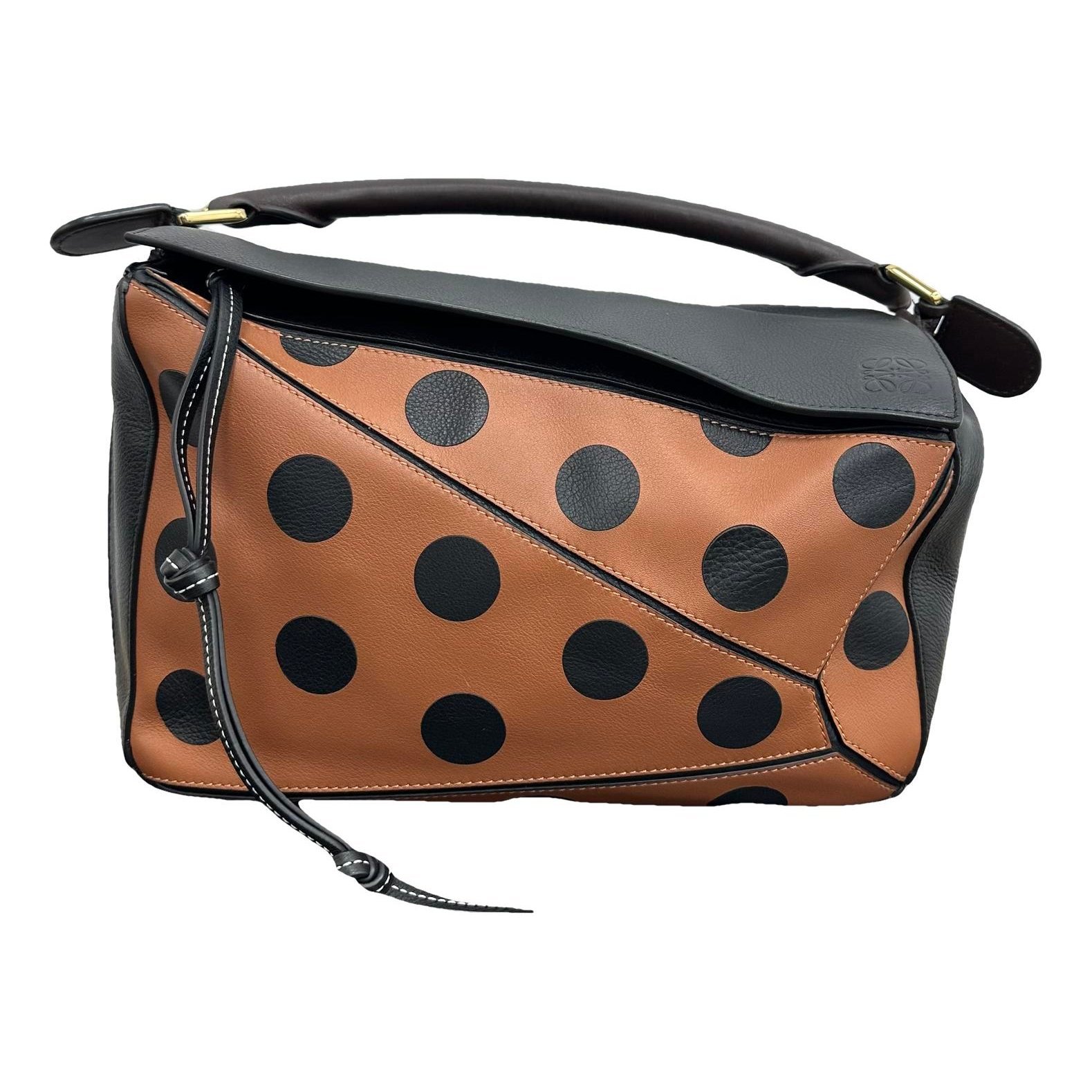 Puzzle leather handbag