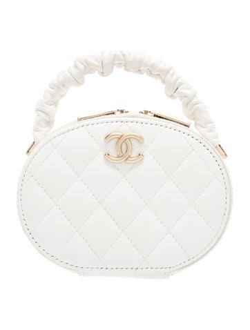 Quilted CC Ruched Top Handle Vanity Bag