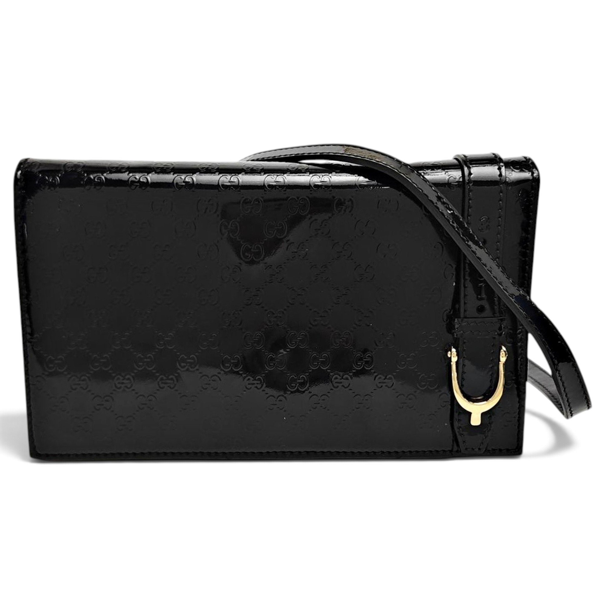 Stirrup patent leather handbag
