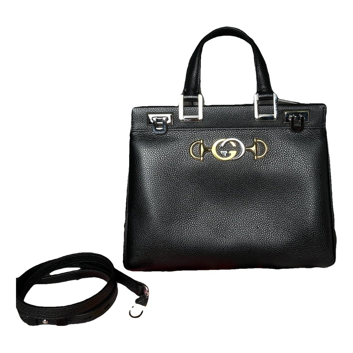Zumi leather handbag