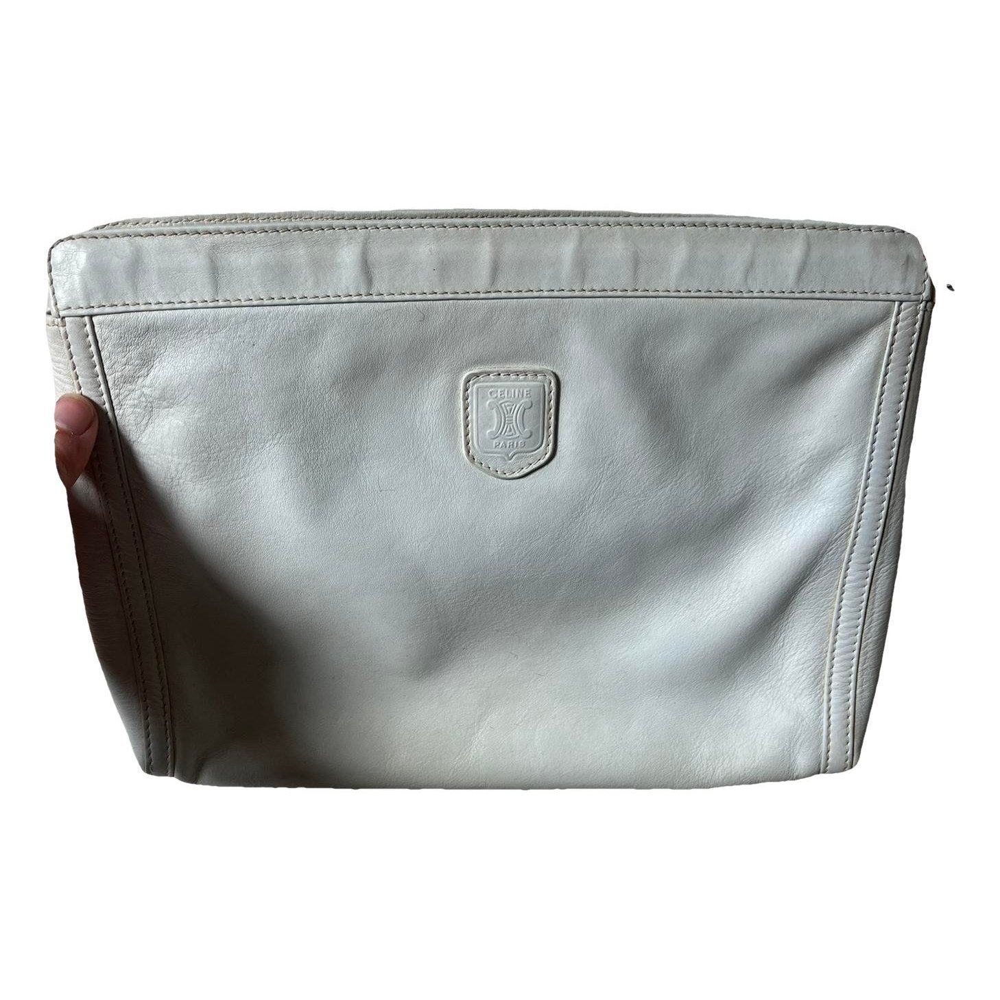 Triomphe Vintage leather clutch bag