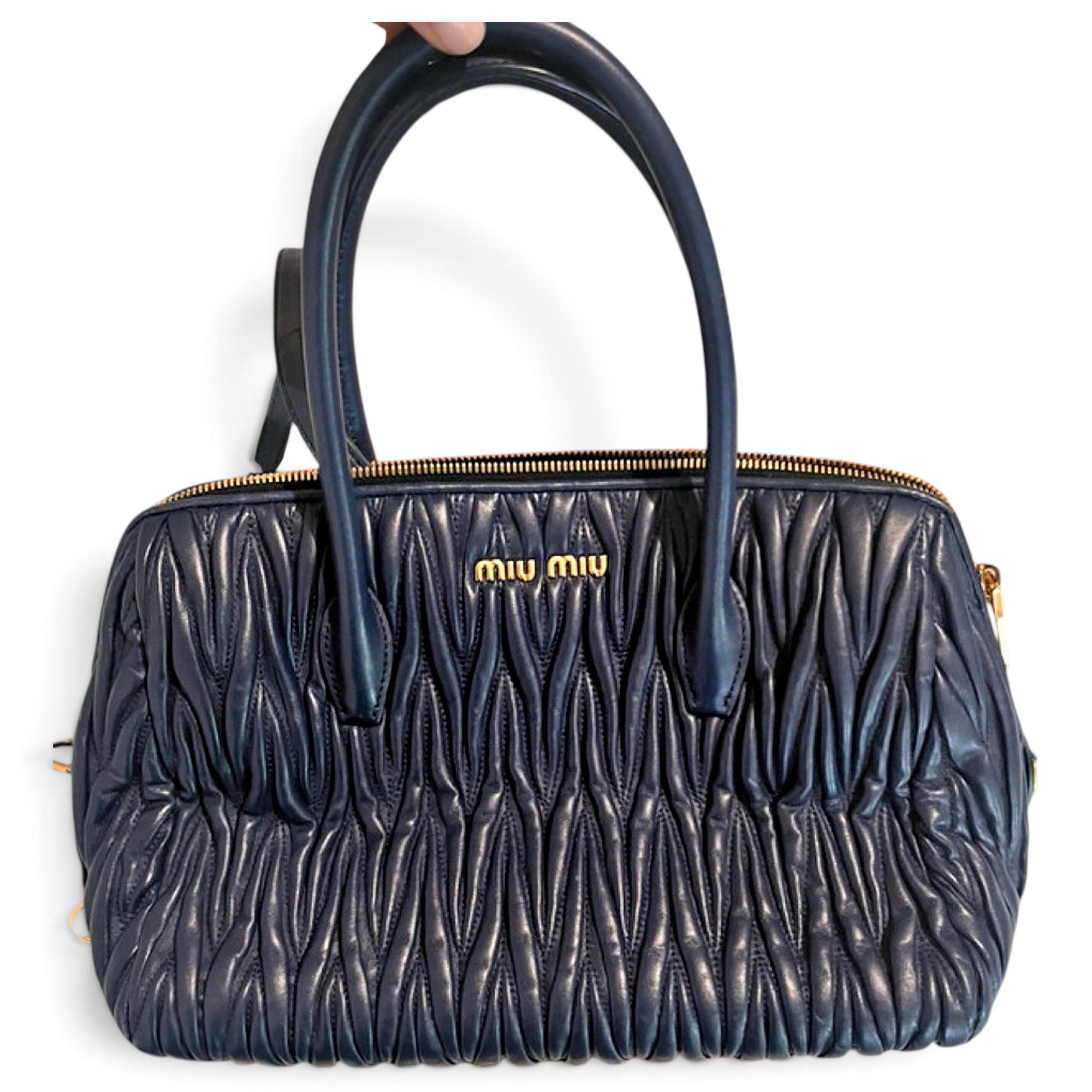 Matelassé leather handbag