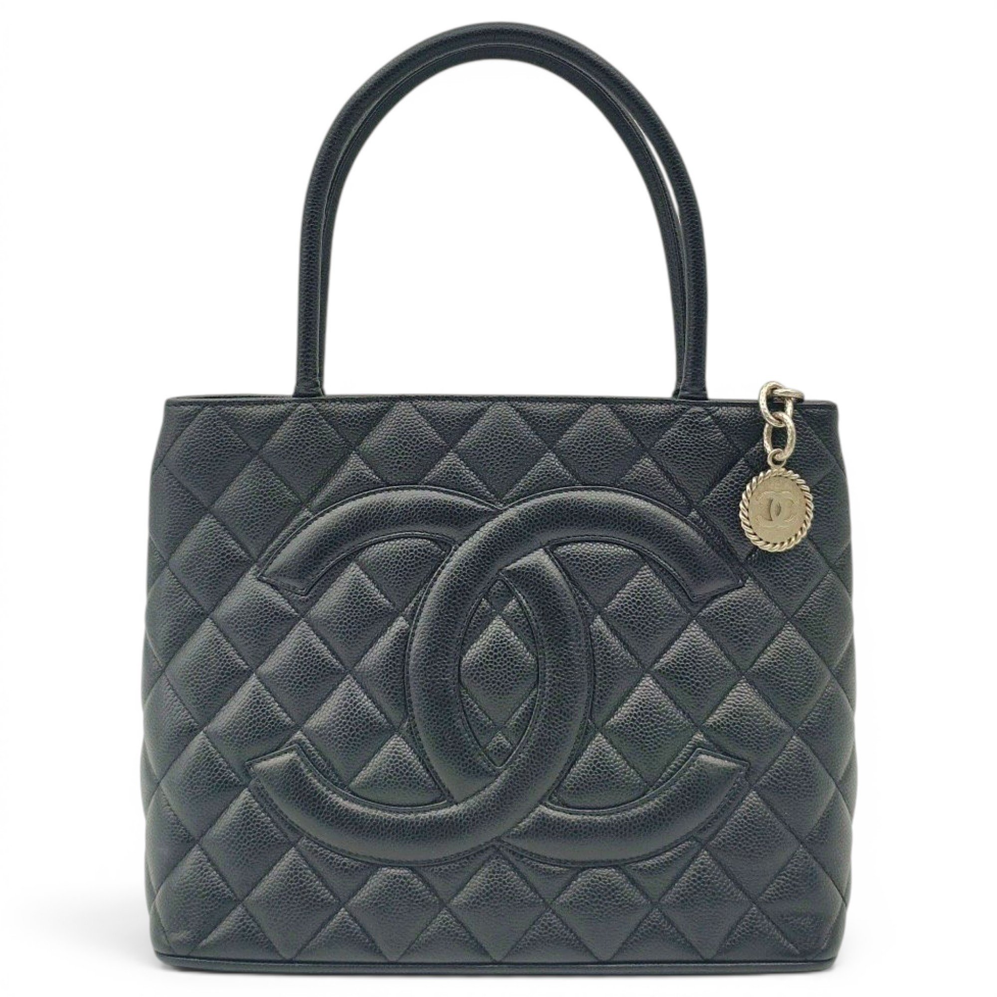 Médaillon leather handbag