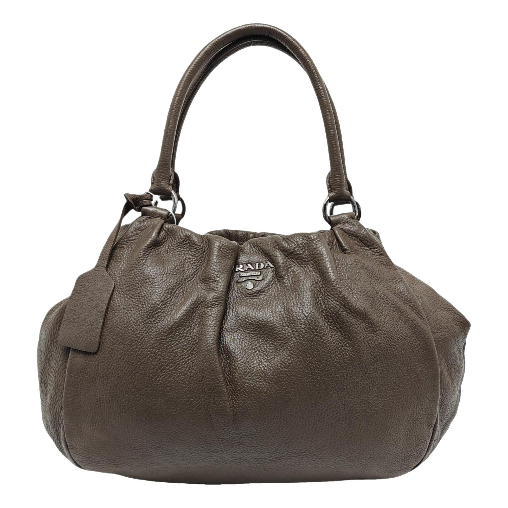 Arqué leather handbag
