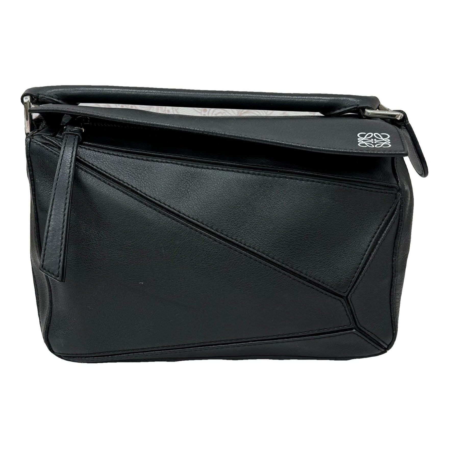 Puzzle leather handbag