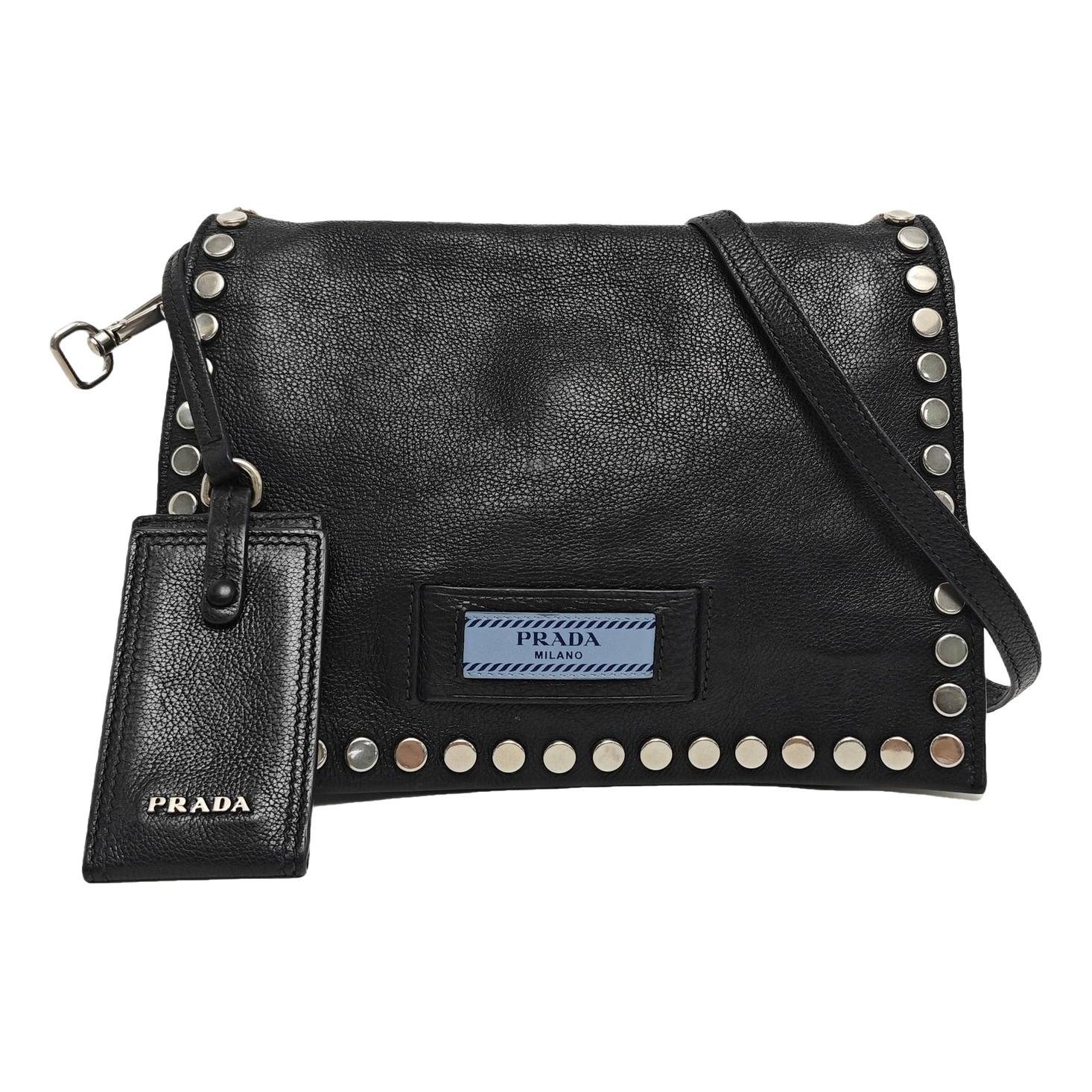 Etiquette leather handbag