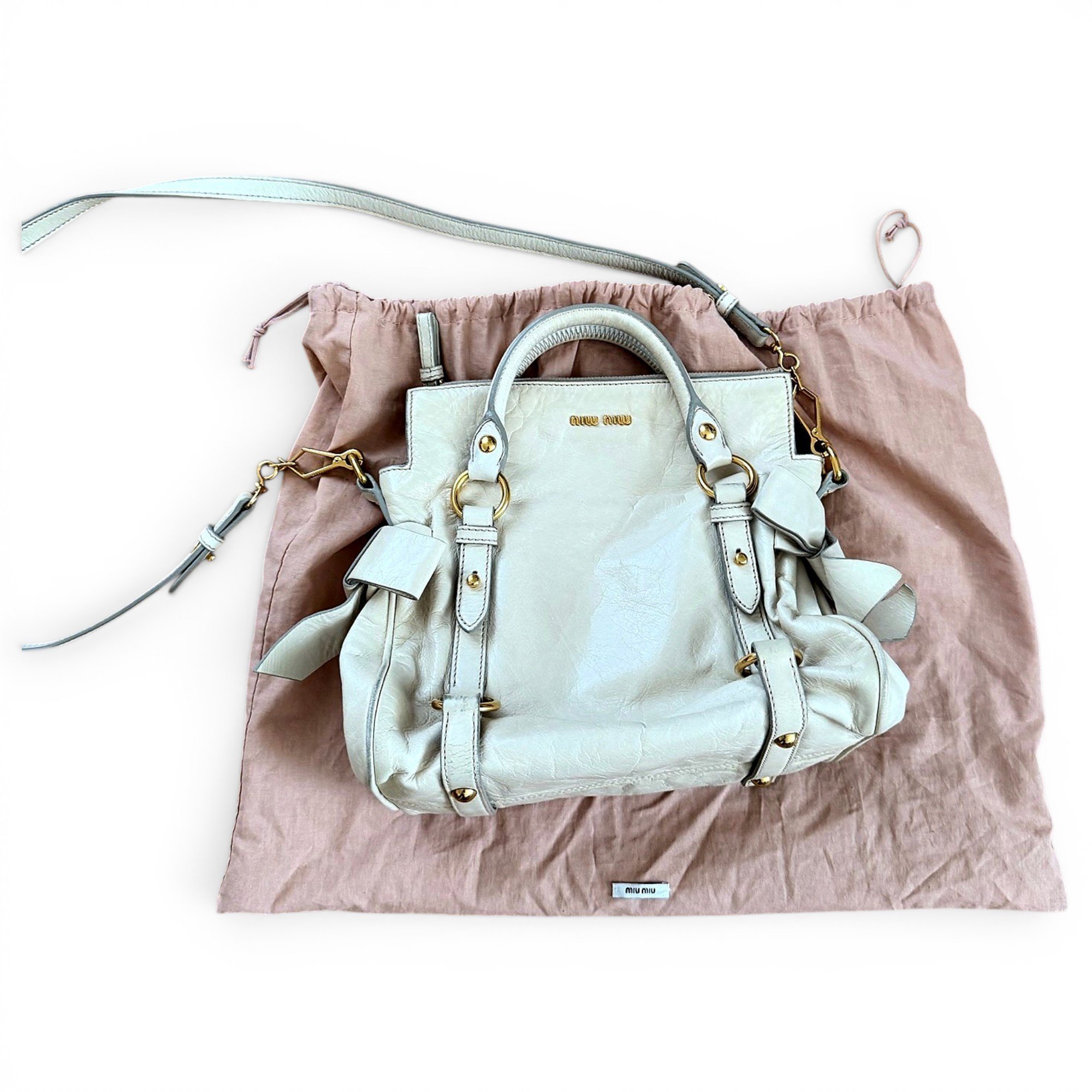 Bow bag leather handbag