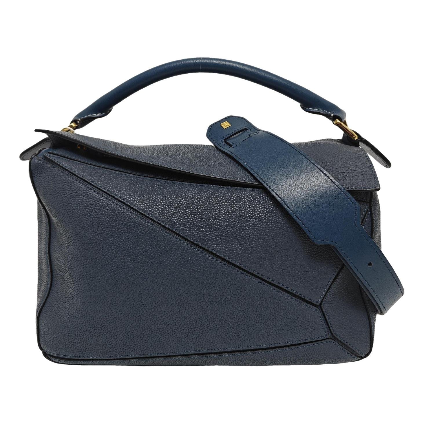 Puzzle leather handbag