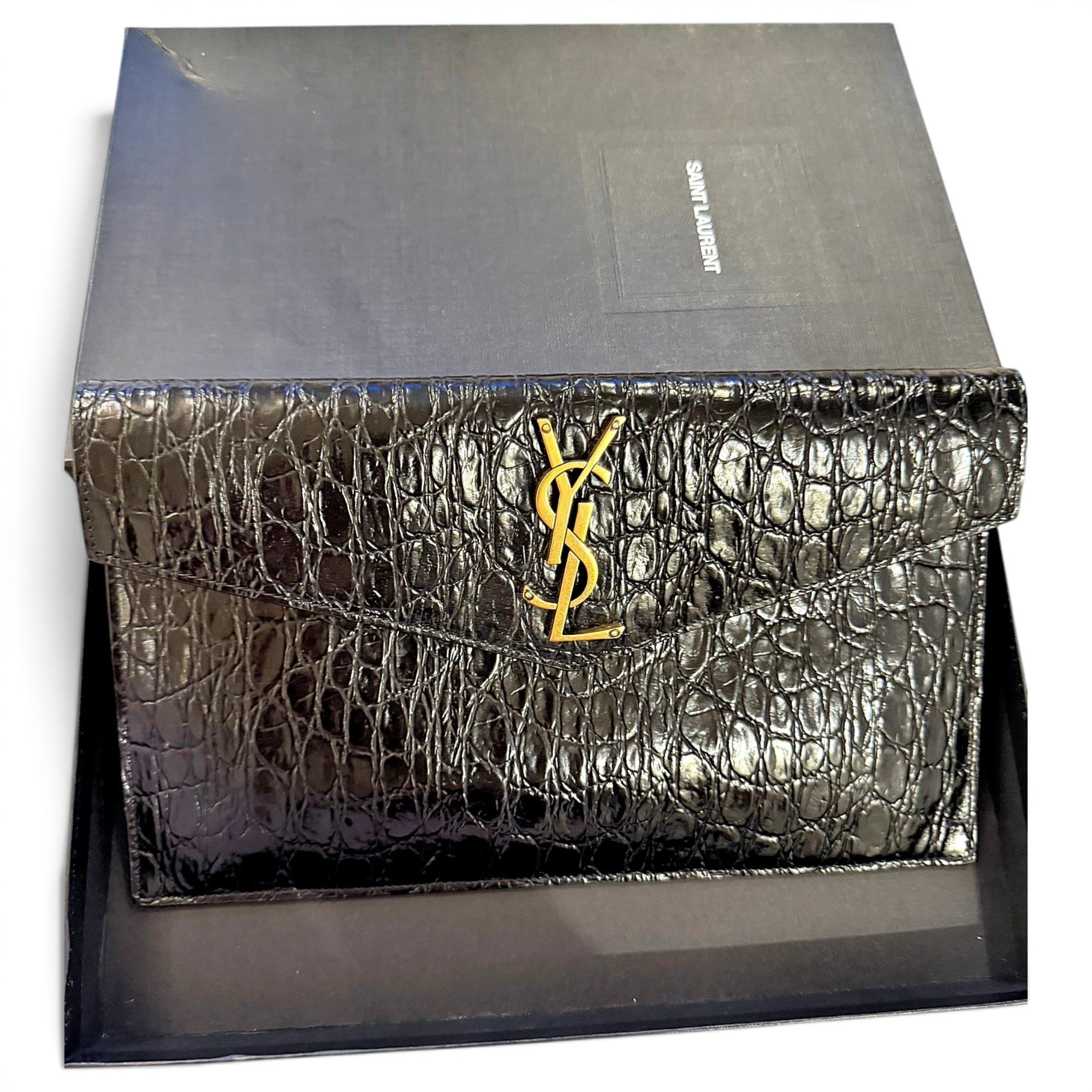 Cassandre leather clutch bag