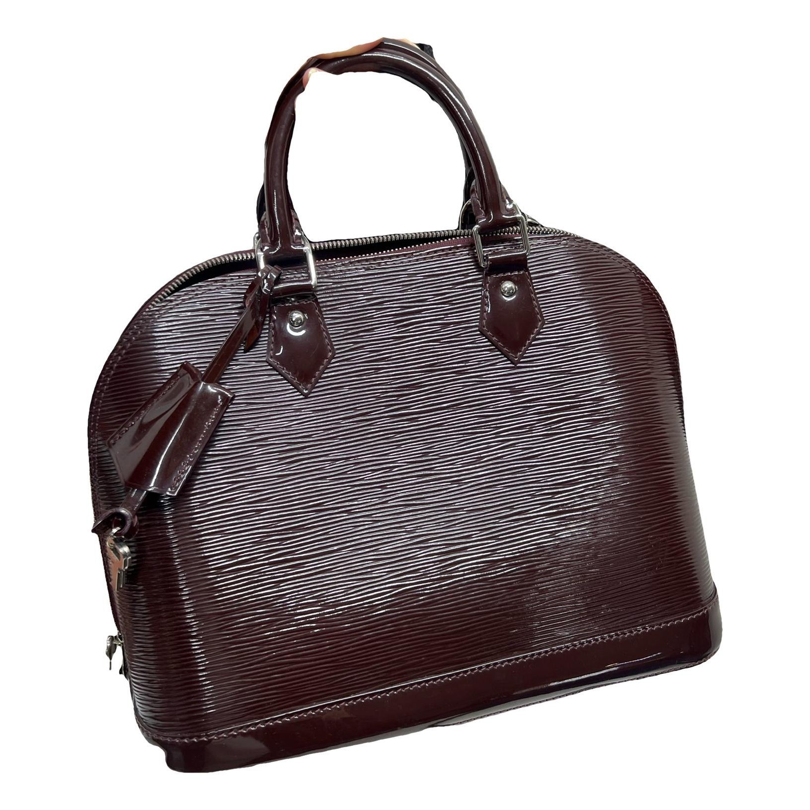 Alma patent leather handbag
