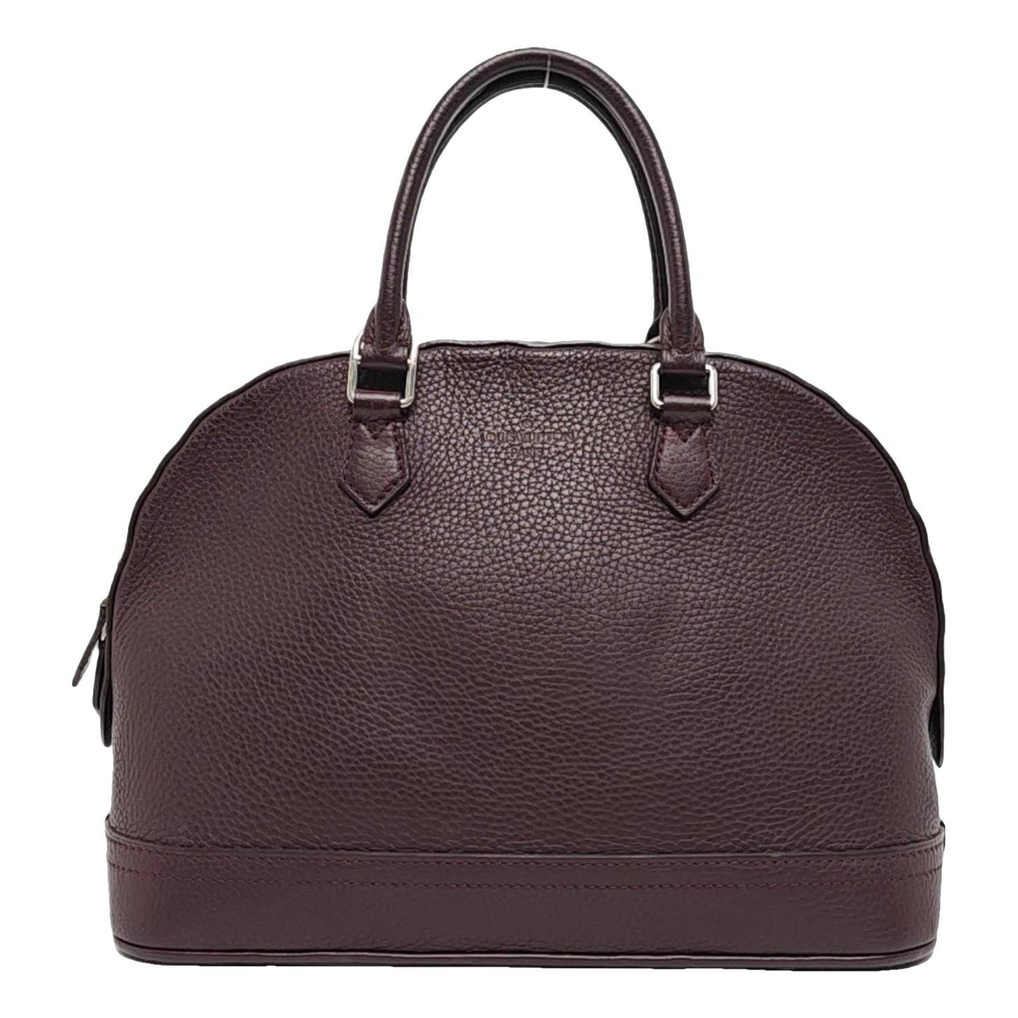 Alma leather handbag