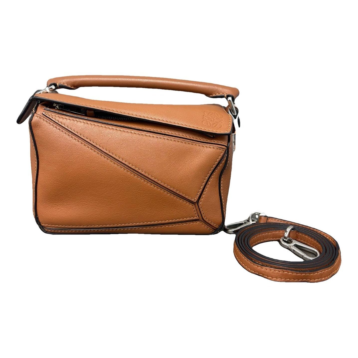 Puzzle leather handbag
