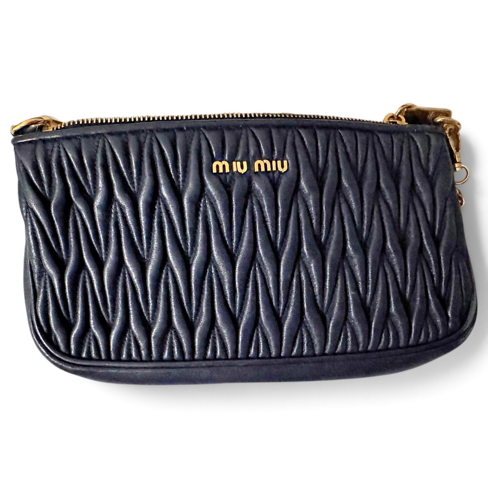 Matelassé leather clutch bag