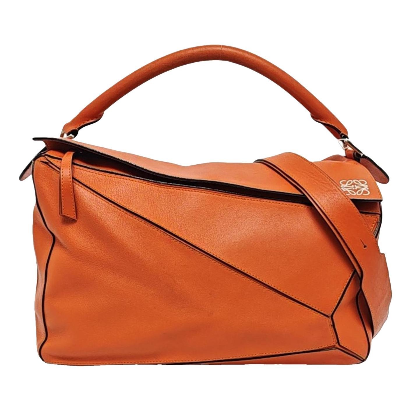 Puzzle leather handbag