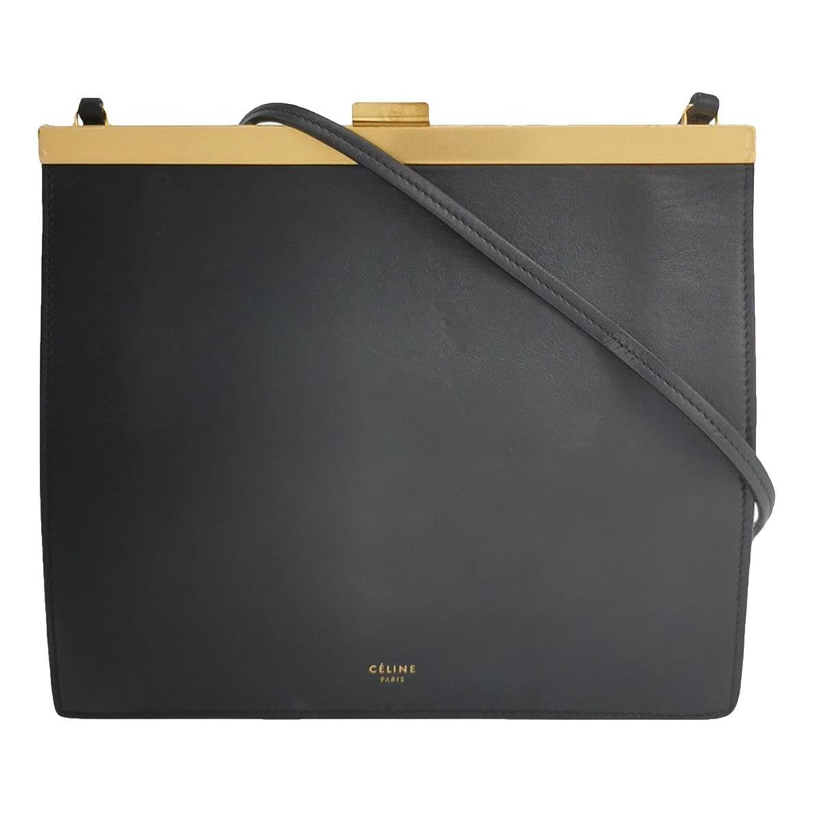 Clasp leather handbag
