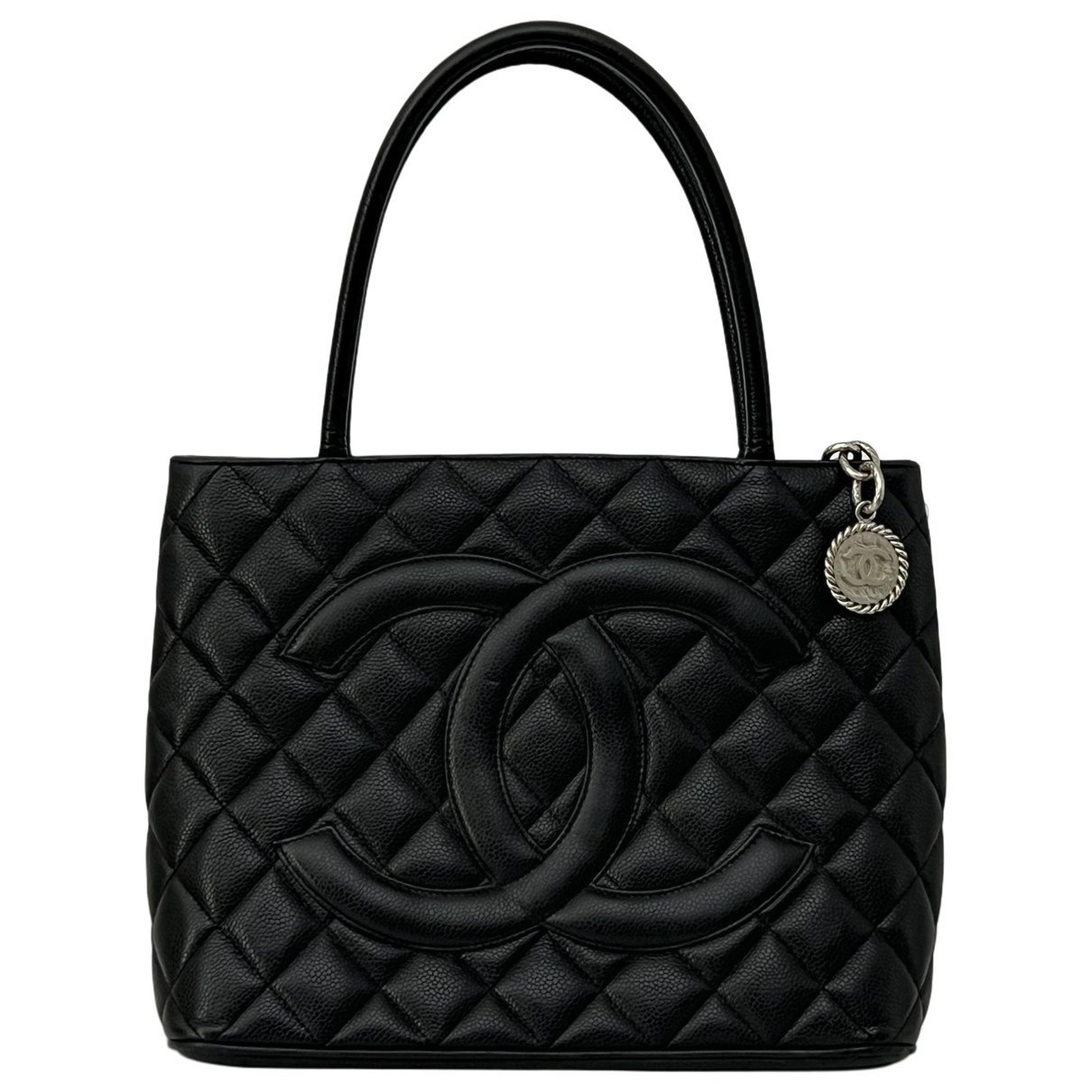 Médaillon leather handbag