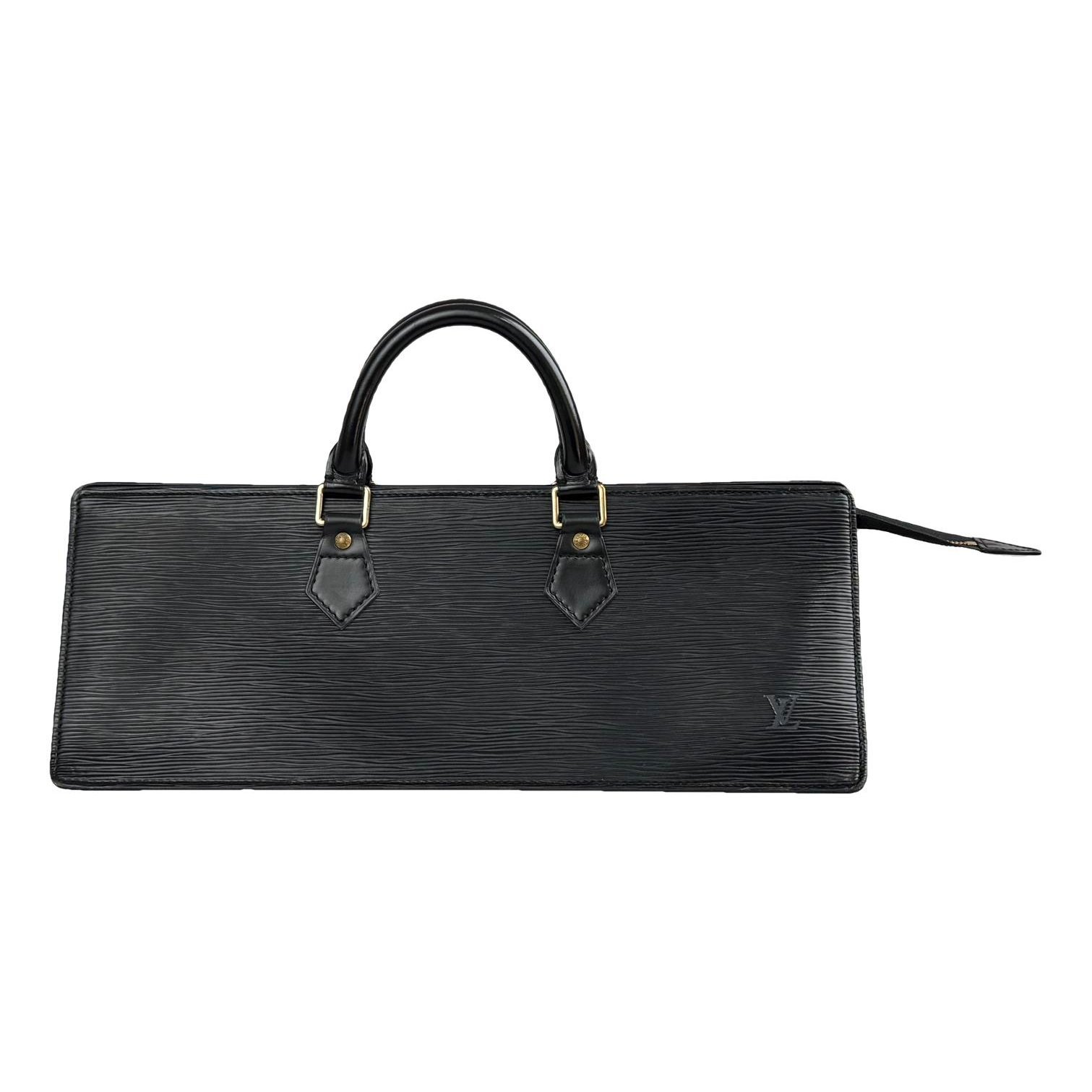 Triangle leather handbag