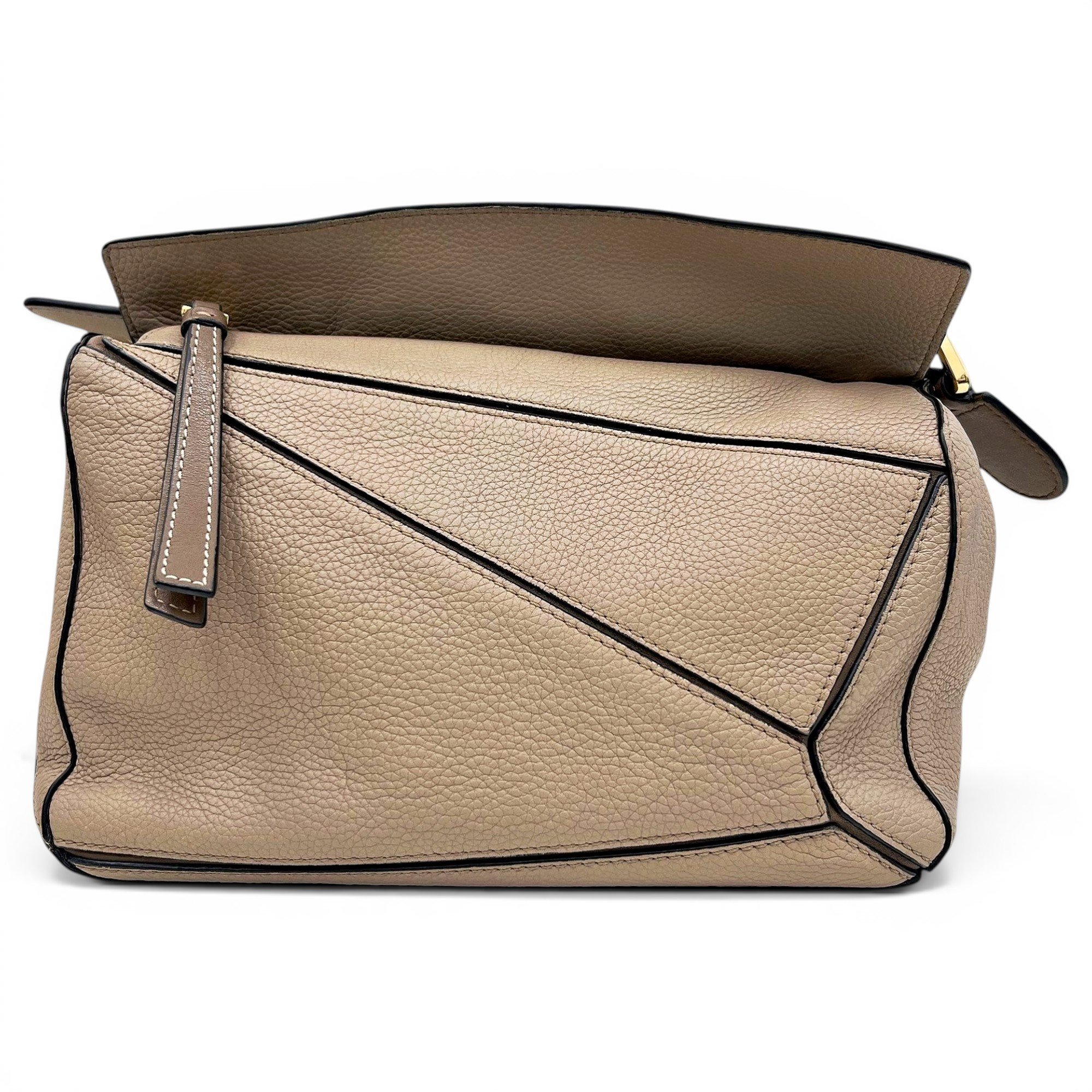 Puzzle leather handbag
