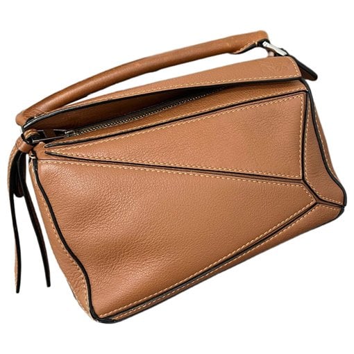 Puzzle leather handbag