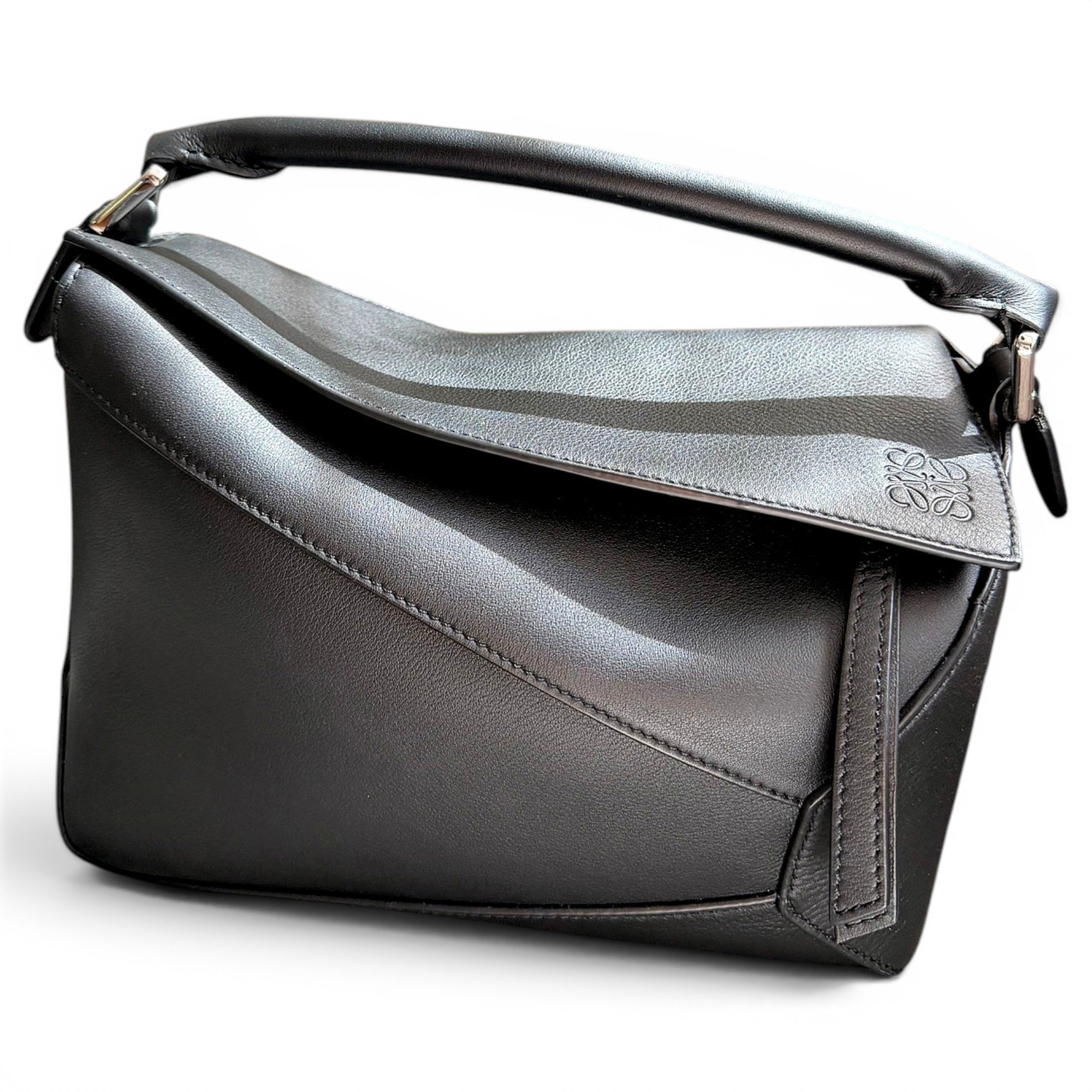 Puzzle leather handbag