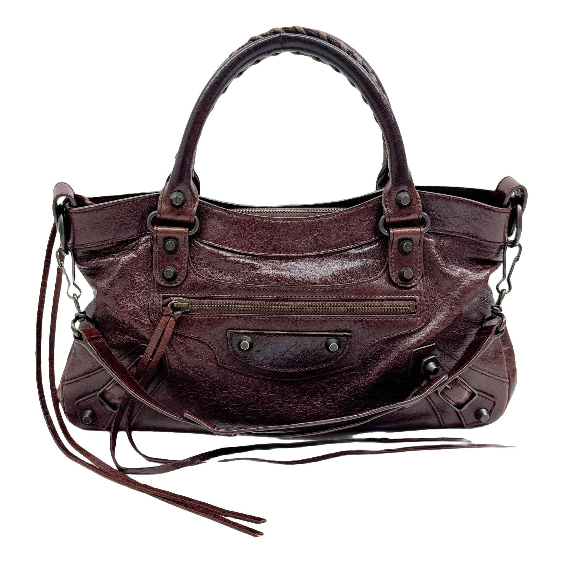 First leather handbag