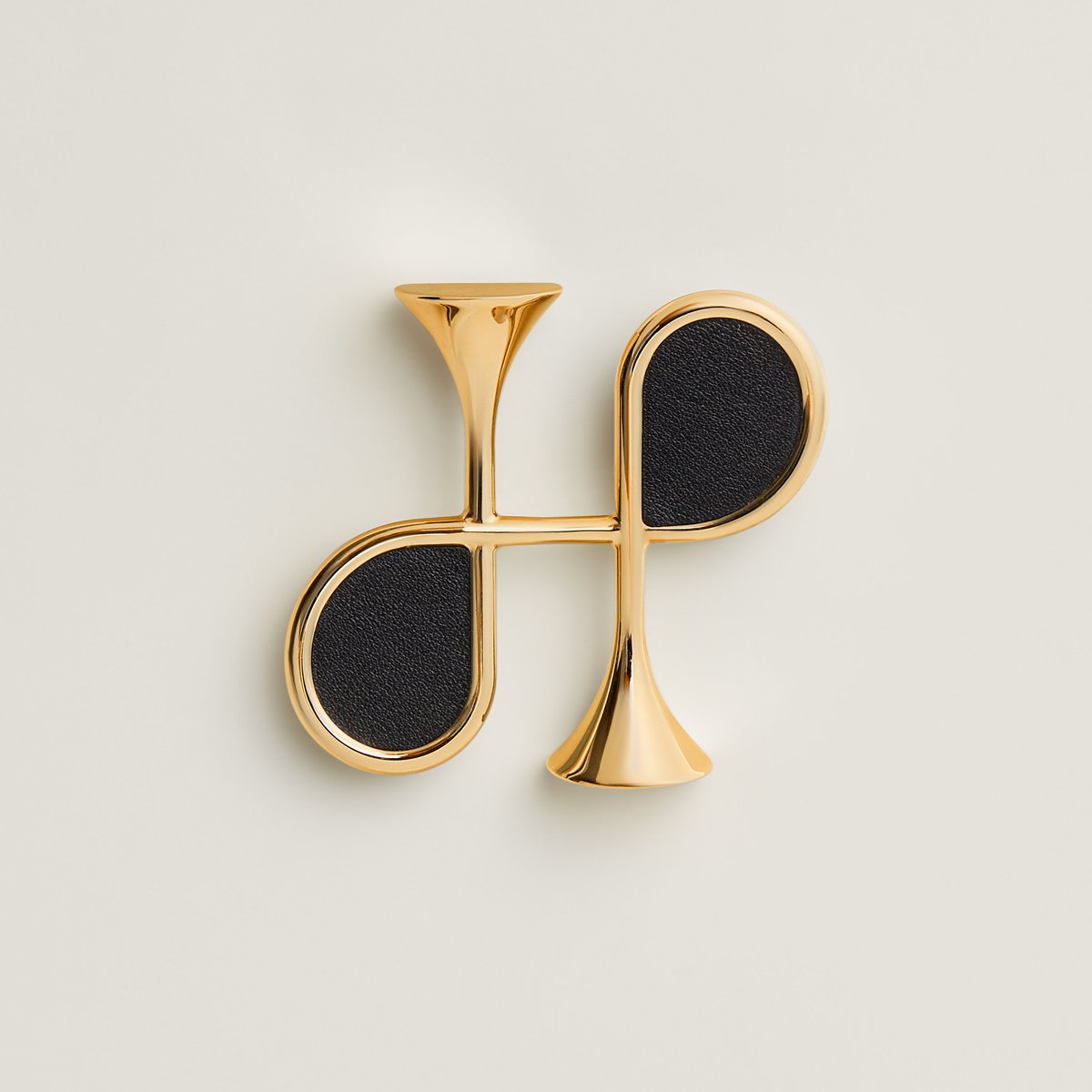 Cor H brooch