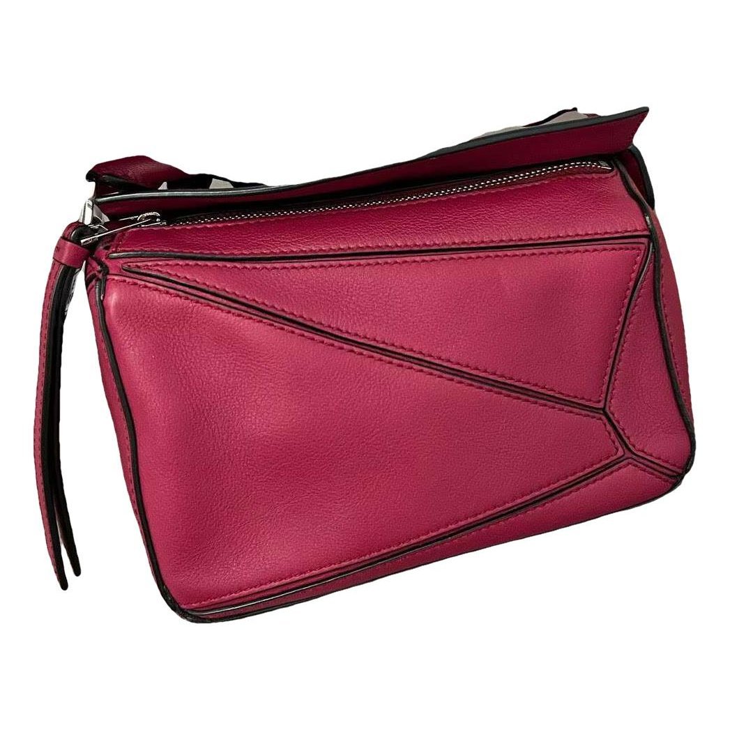 Puzzle leather handbag