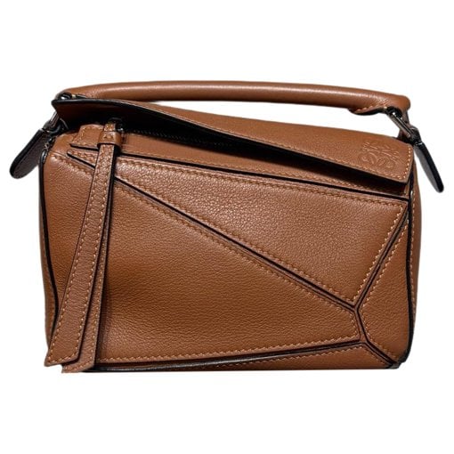 Puzzle leather handbag