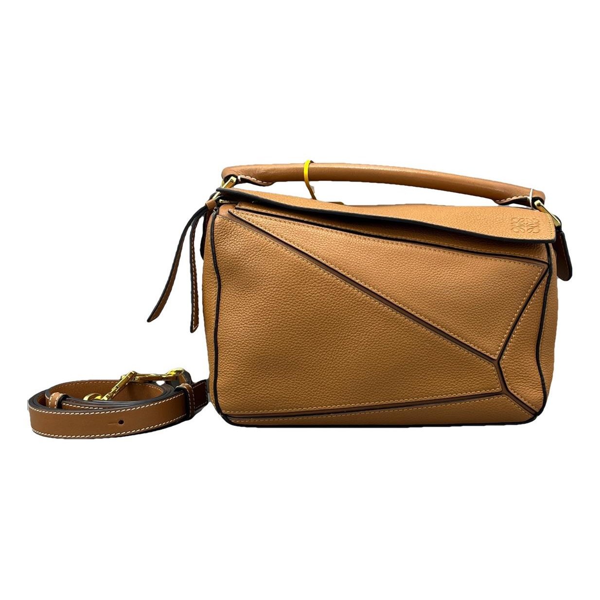 Puzzle leather handbag