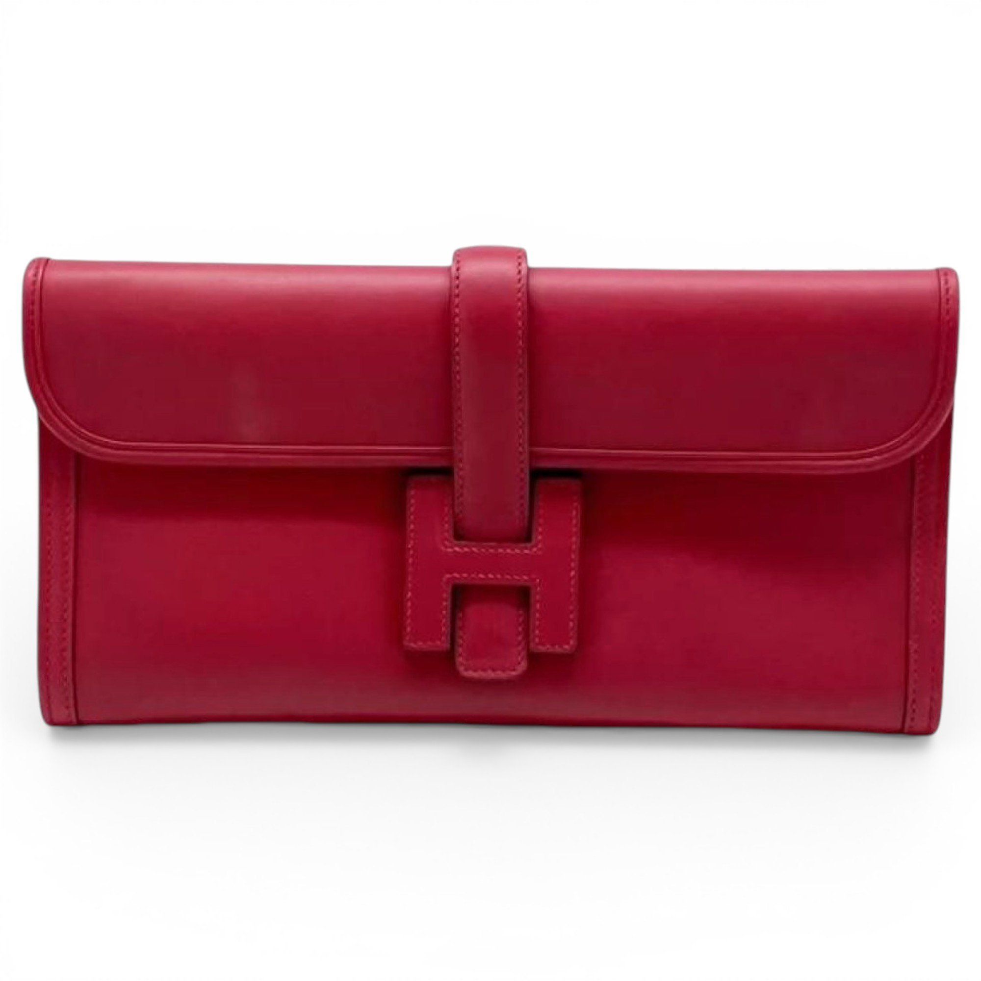 Jige leather clutch bag