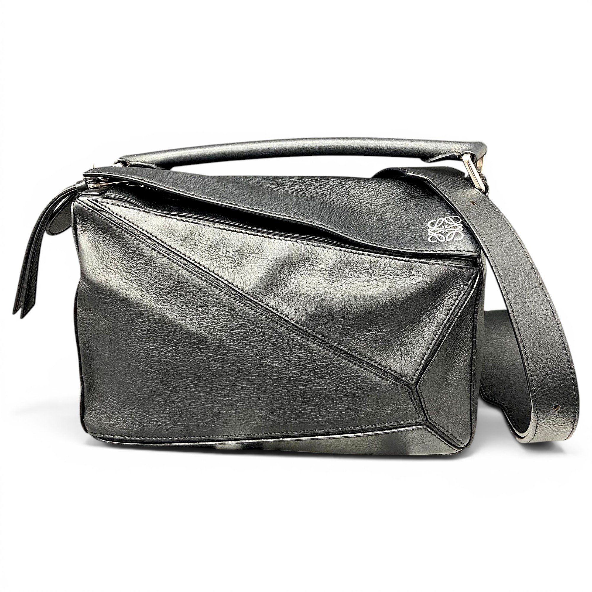 Puzzle leather handbag