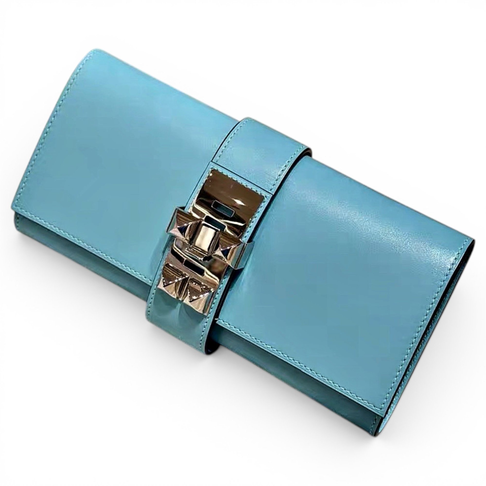 Médor leather clutch bag